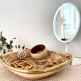 Empty rattan and brass pocket