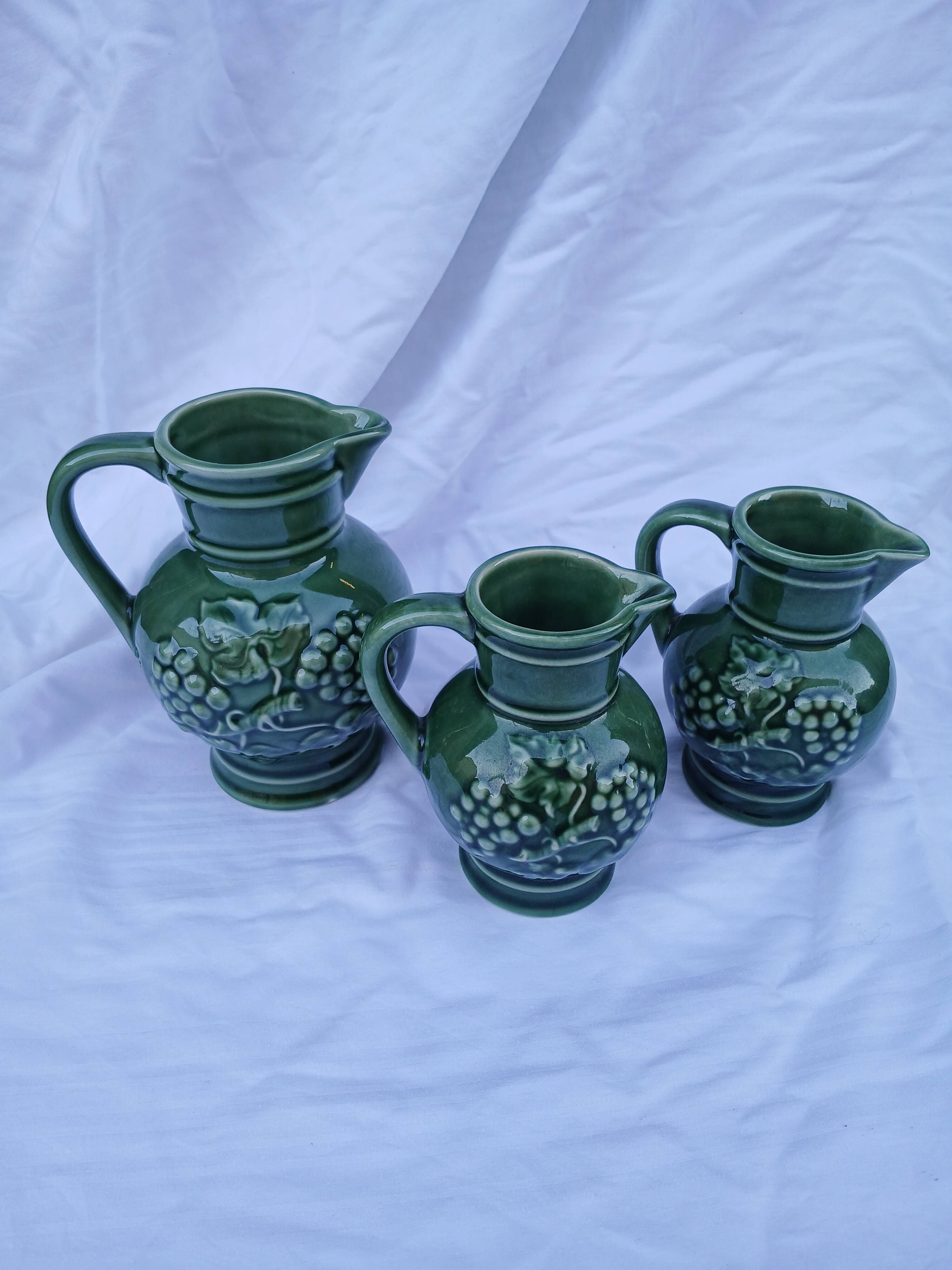 3 antique wine jugs