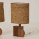 Pair of handcrafted lamps in solid oak with cork shades, circa 1970