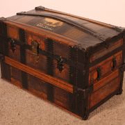 travel trunk from the early 20th century made of leather and wood