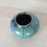 Ball vase with blue drippings