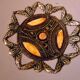 Hollow glazed terracotta dish with oriental decor to hang