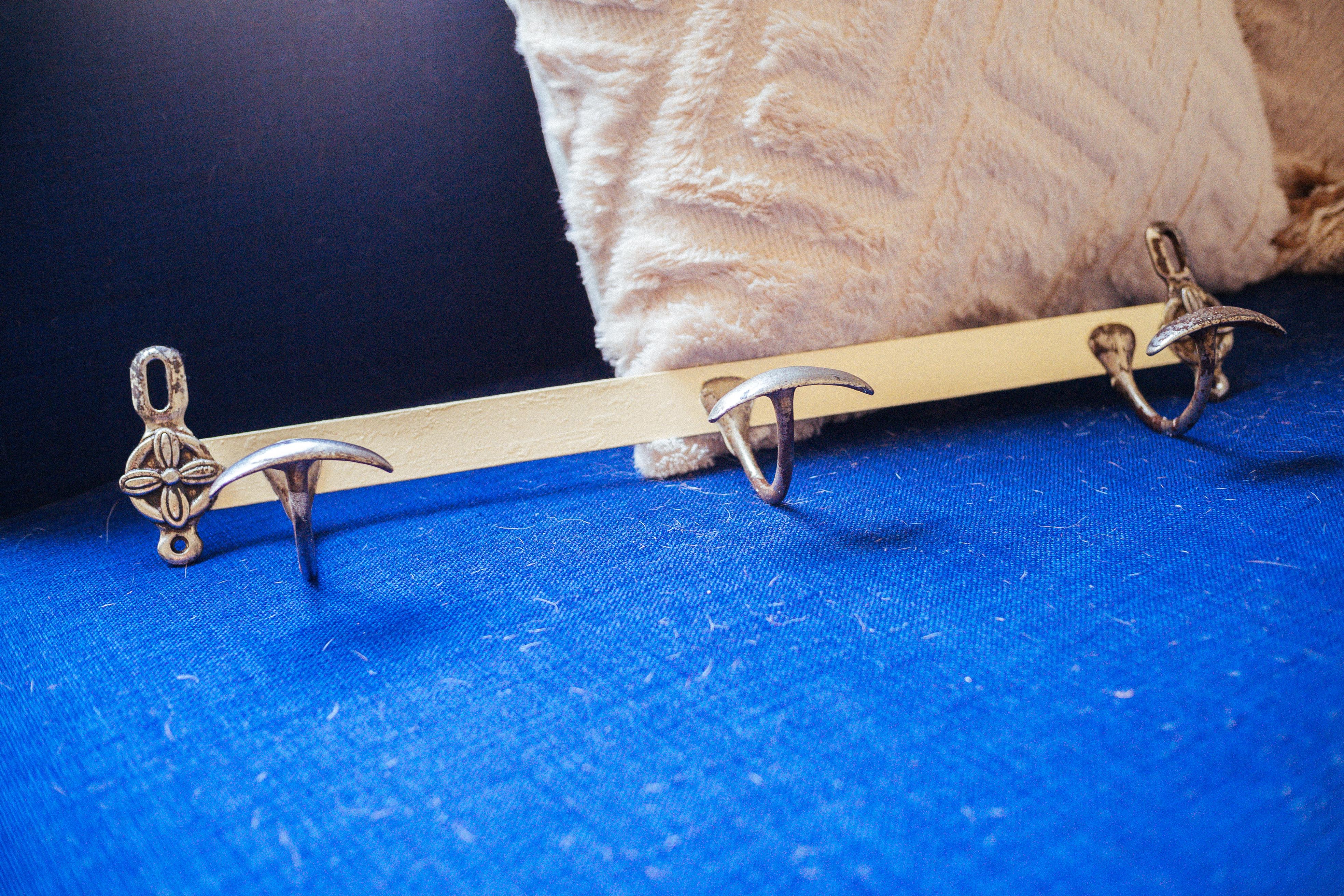 Antique wrought iron coat rack