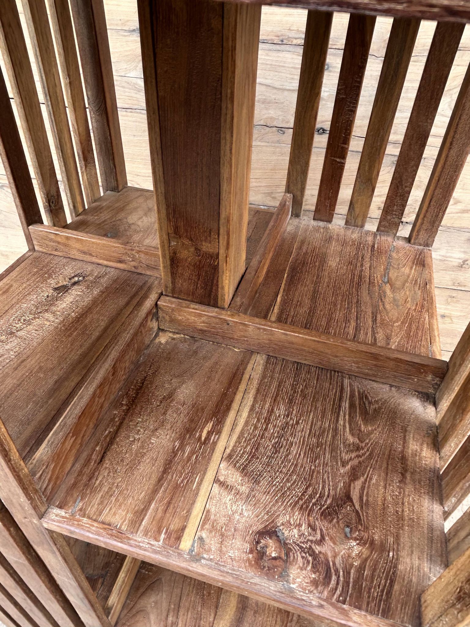 rotating library in Burmese teak