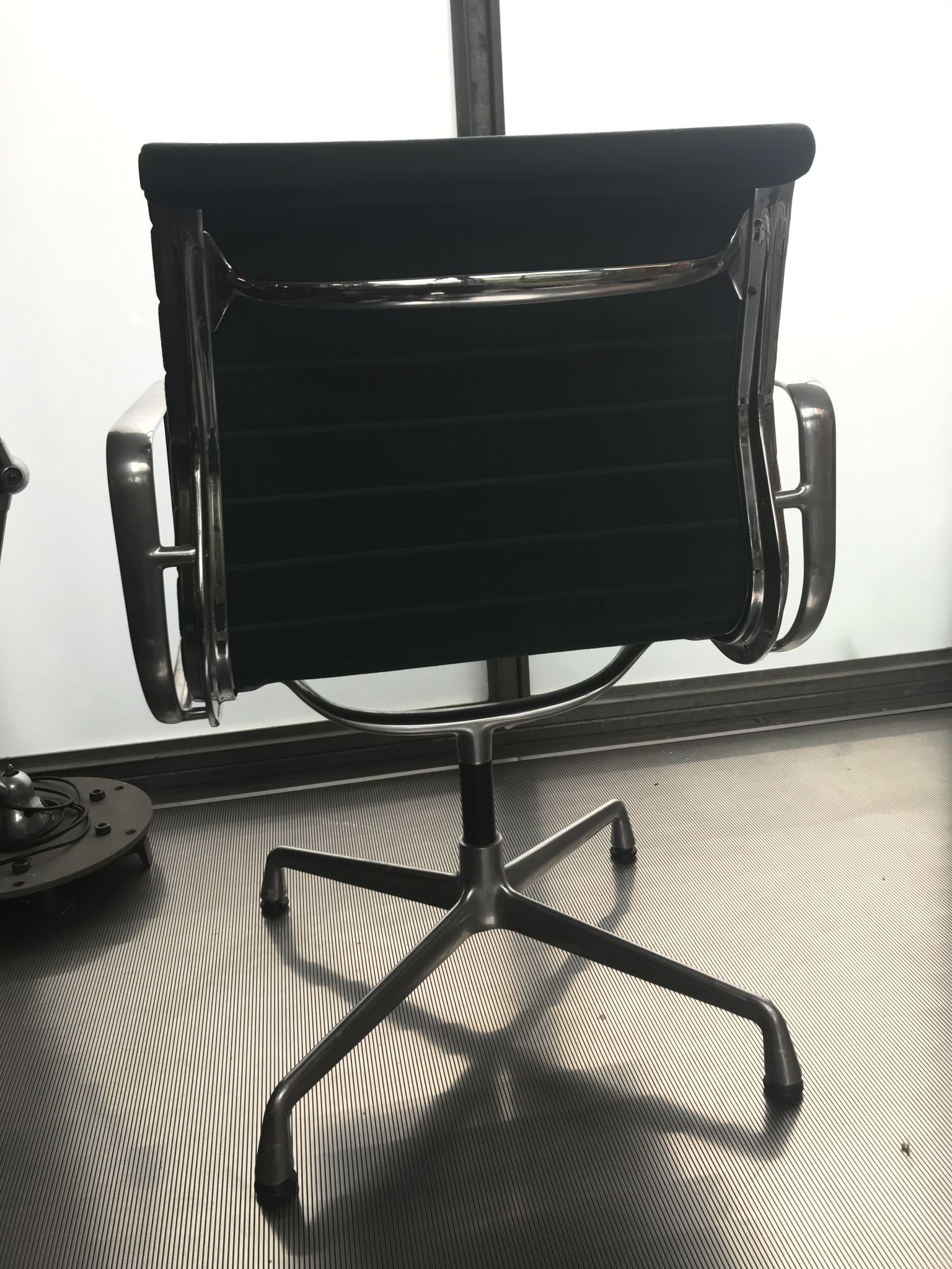 EA107 armchair by Charles and Ray Eames for Vitra