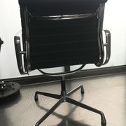 EA107 armchair by Charles and Ray Eames for Vitra