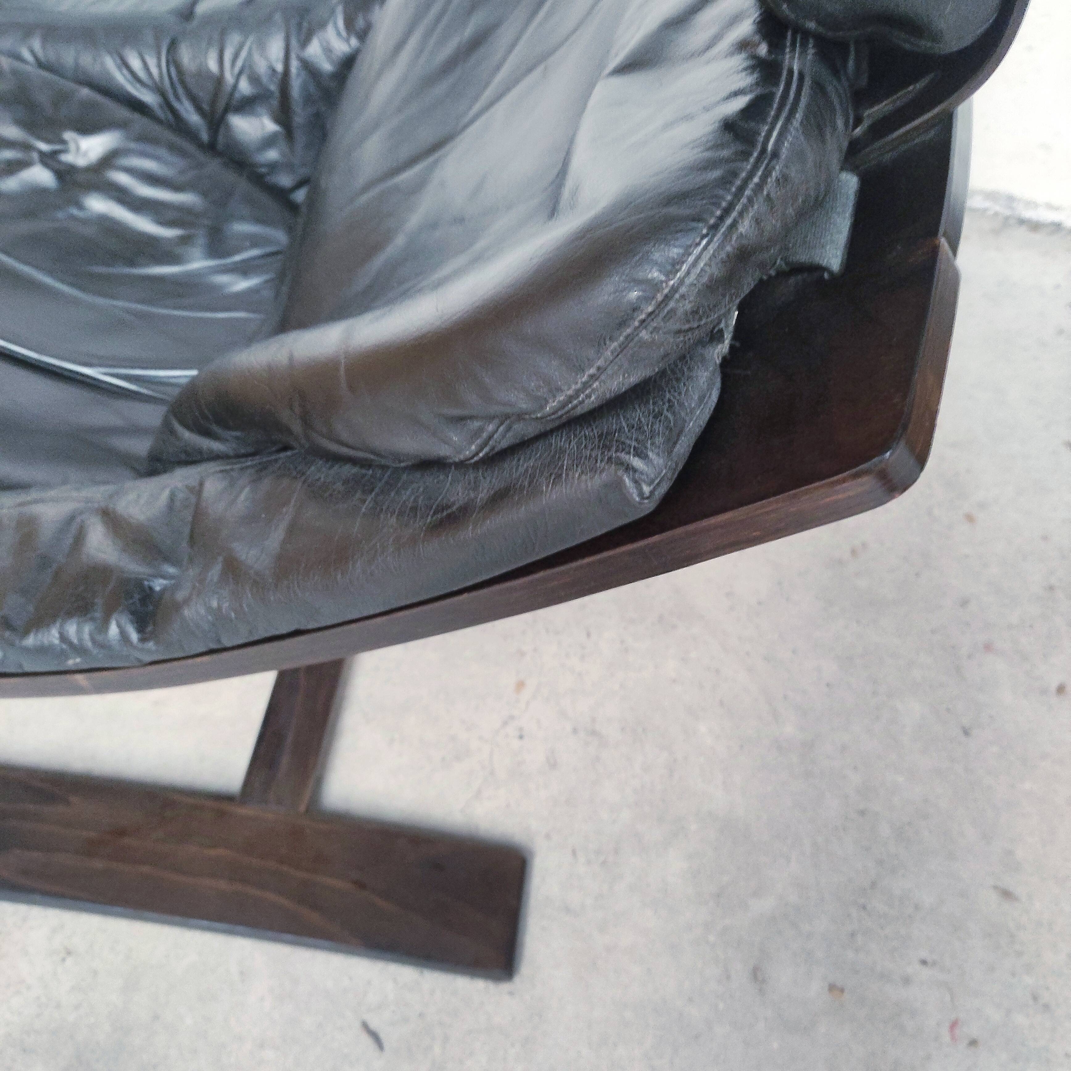 Pair of Kroken armchairs in black leather