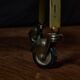 Vintage rolling trolley in gold metal & smoked glass – Retro elegance as