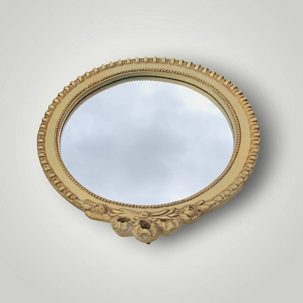 Antique small round wall mirror in gold resin - love knot