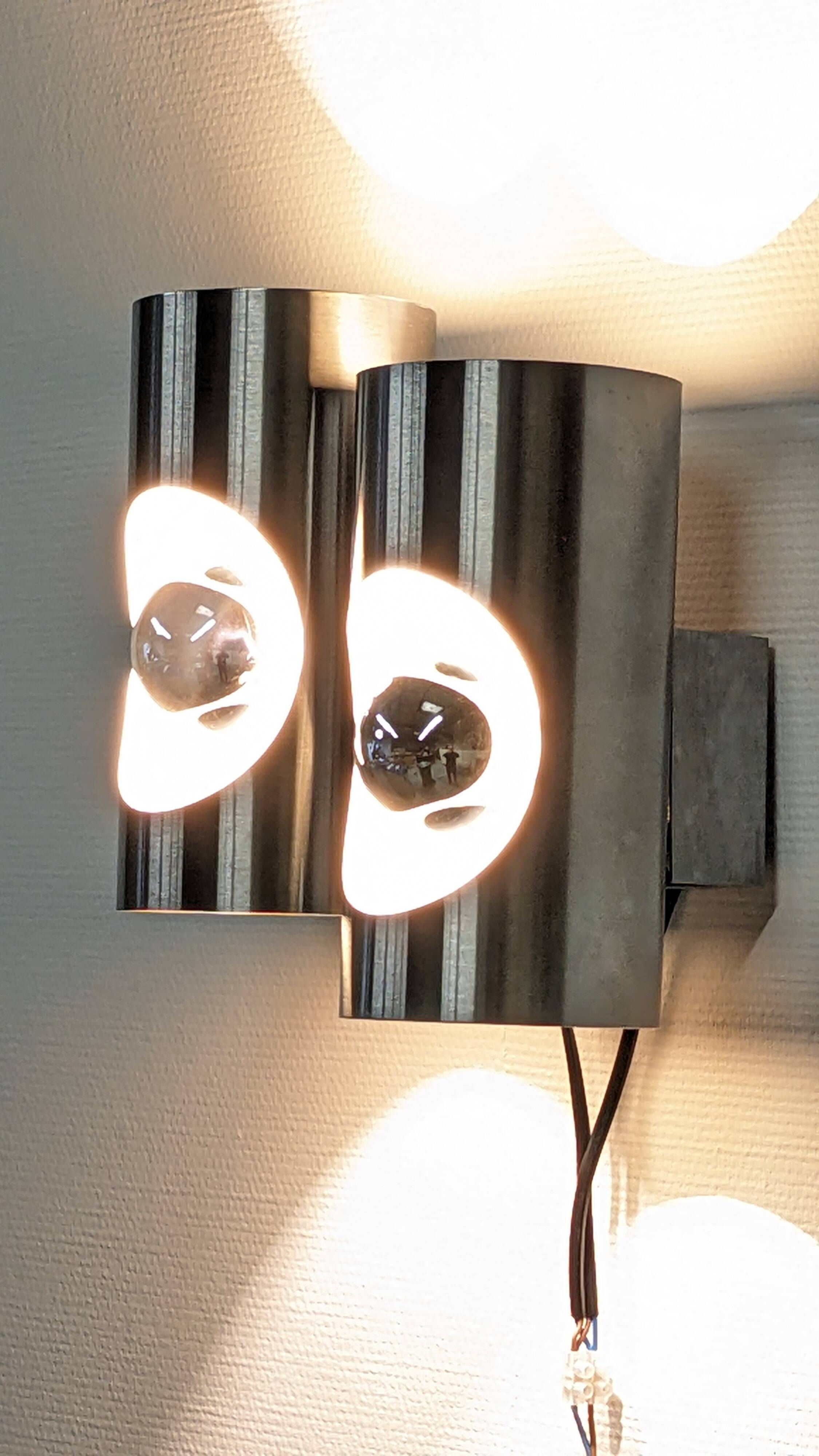 Pair of Space Age double pipe wall lights by Oxar France, 1960s-70s