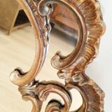 Antique mirror with rococo-style pareclose, in gilded wood, 19th century