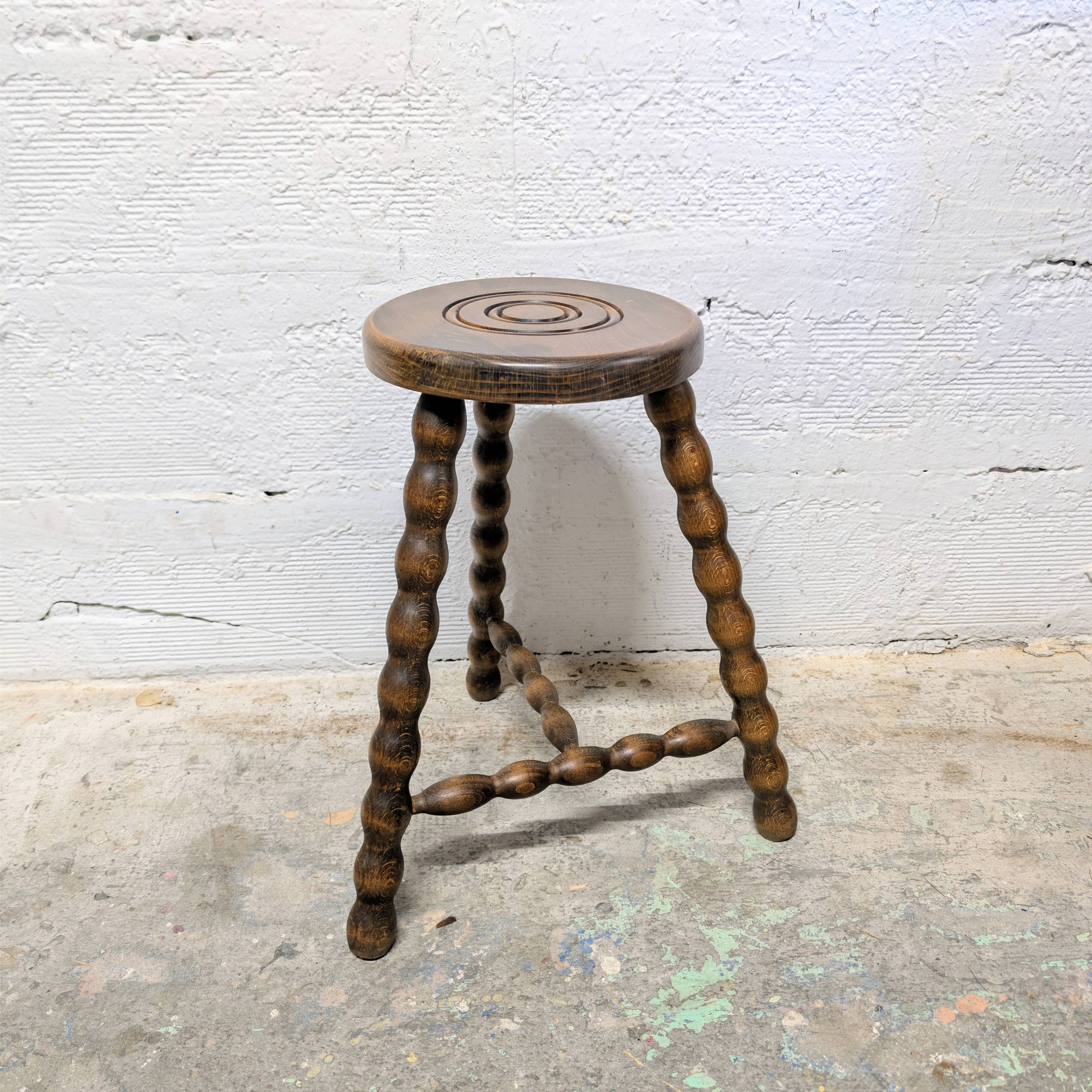 Turned wooden tripod stool