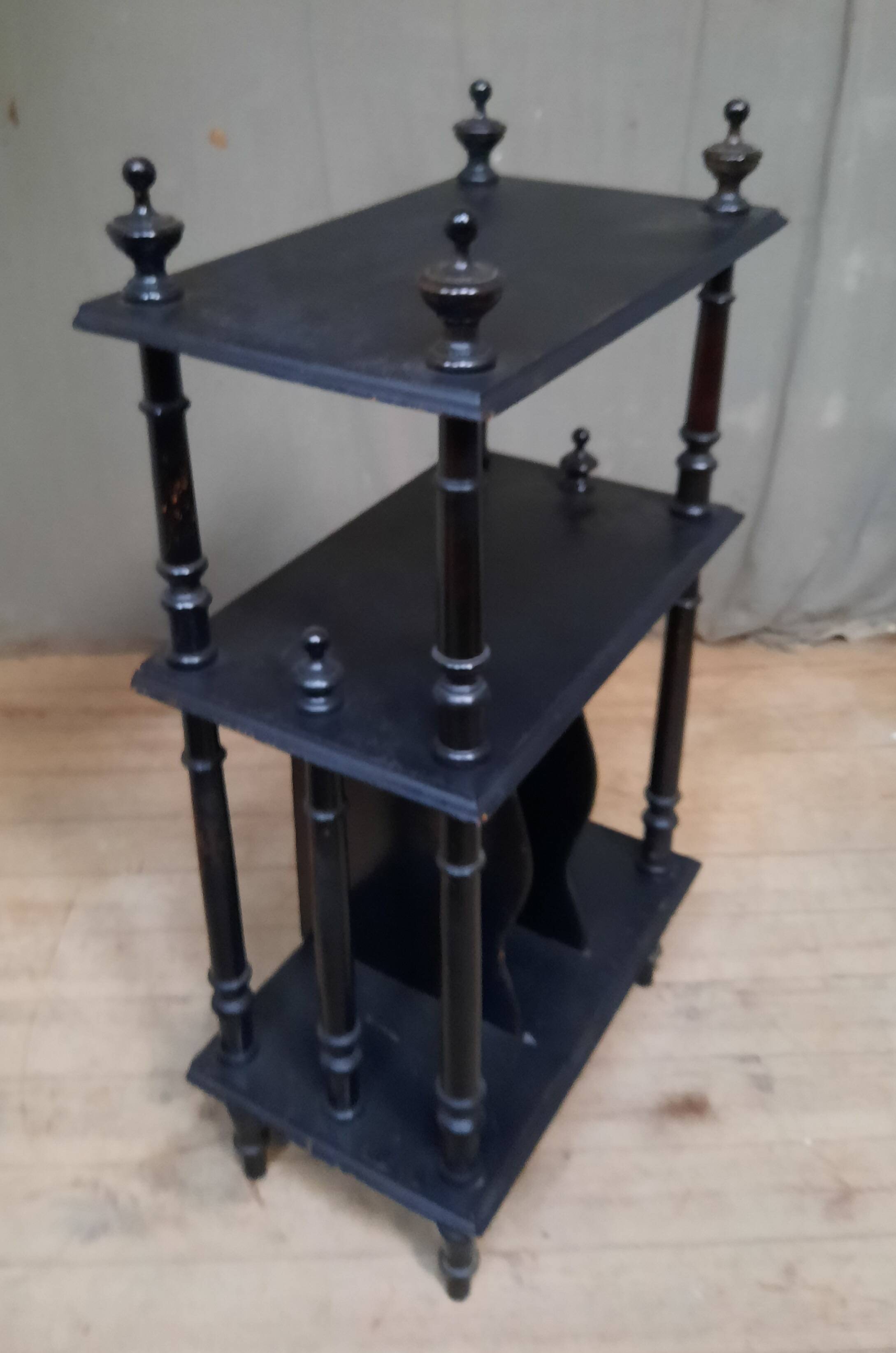 Blackened wooden shelf