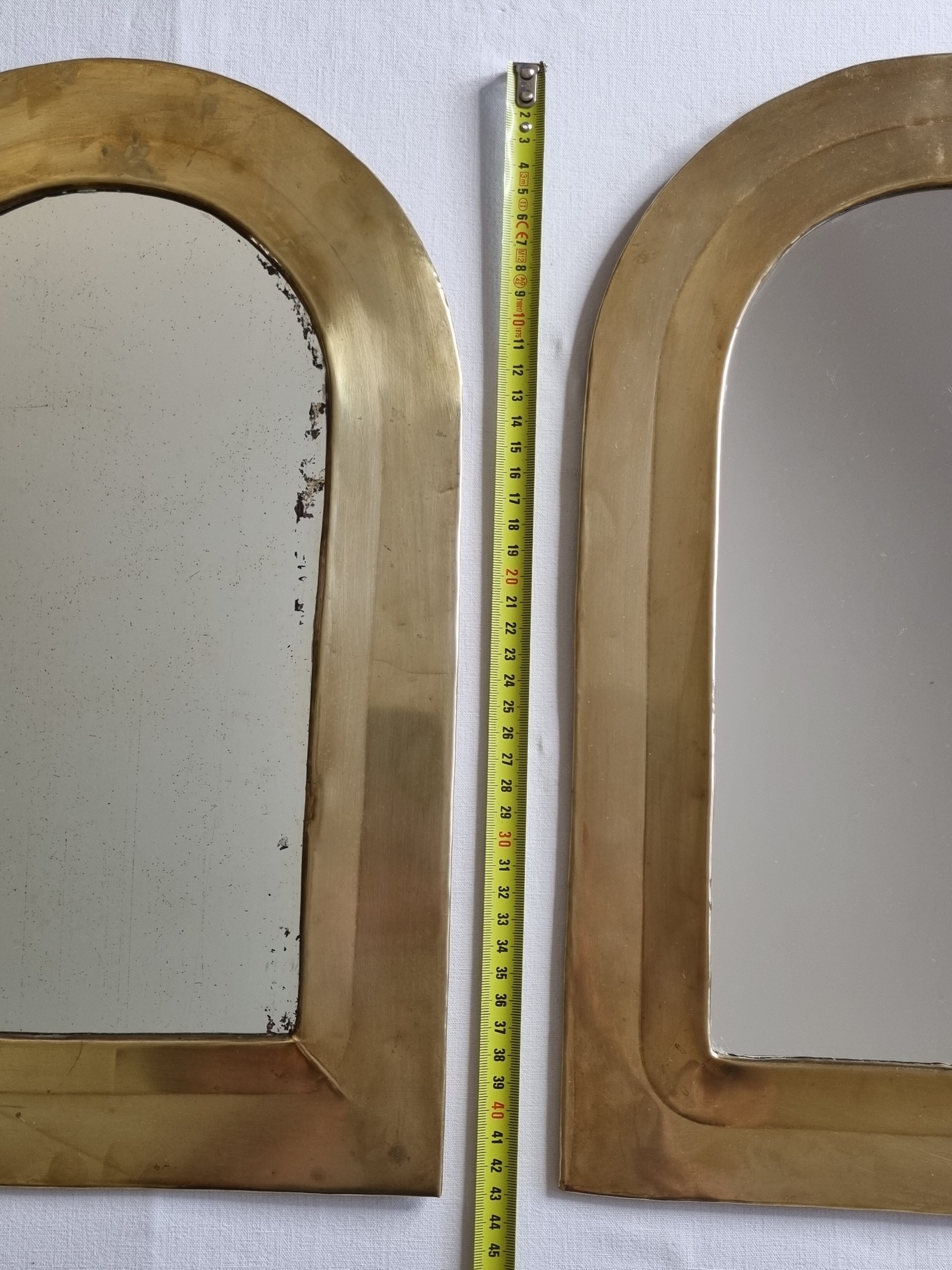 Set of three Moroccan brass mirrors in the form of arches, 43 cm