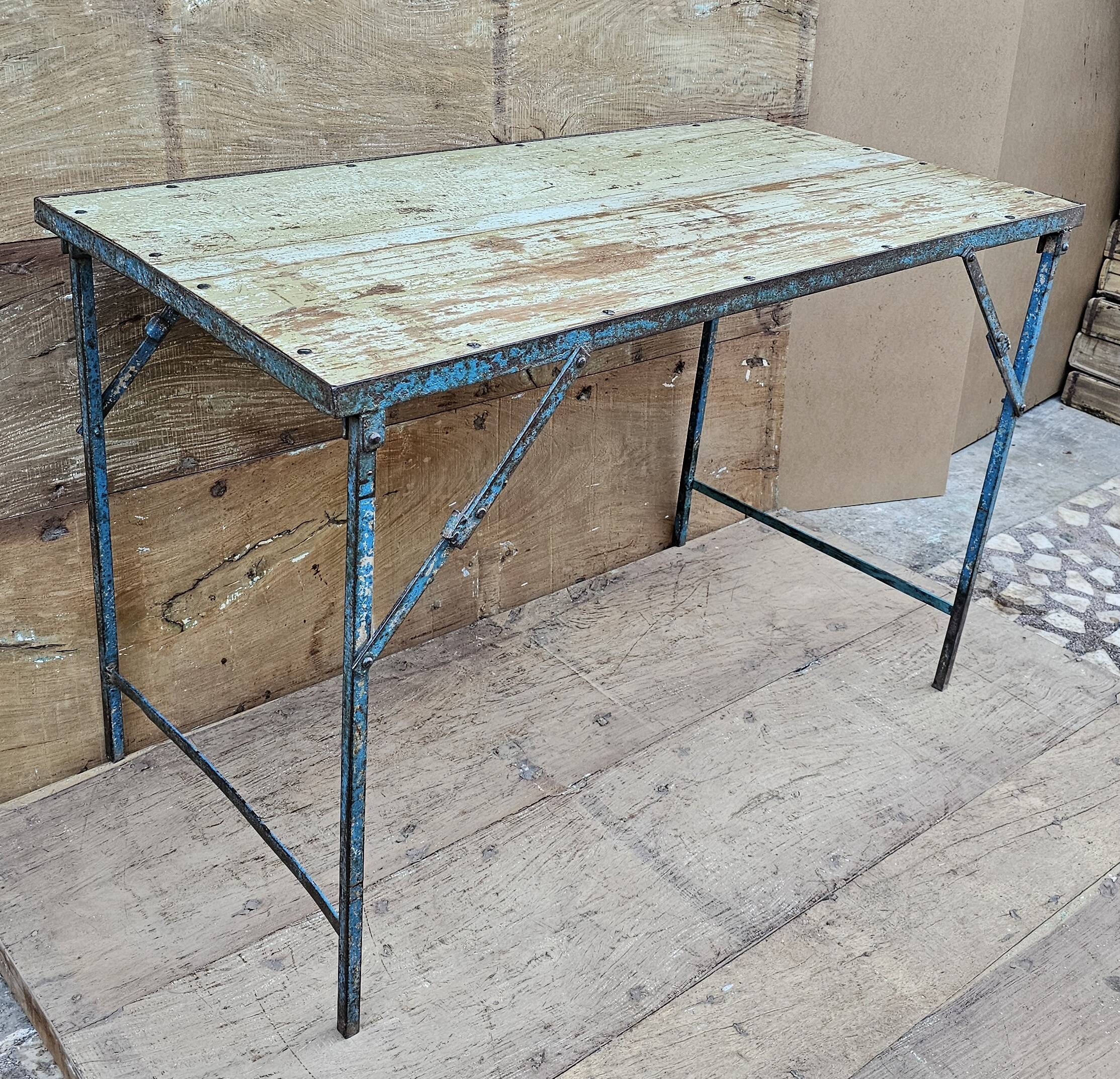Old folding table in Burmese teak and steel