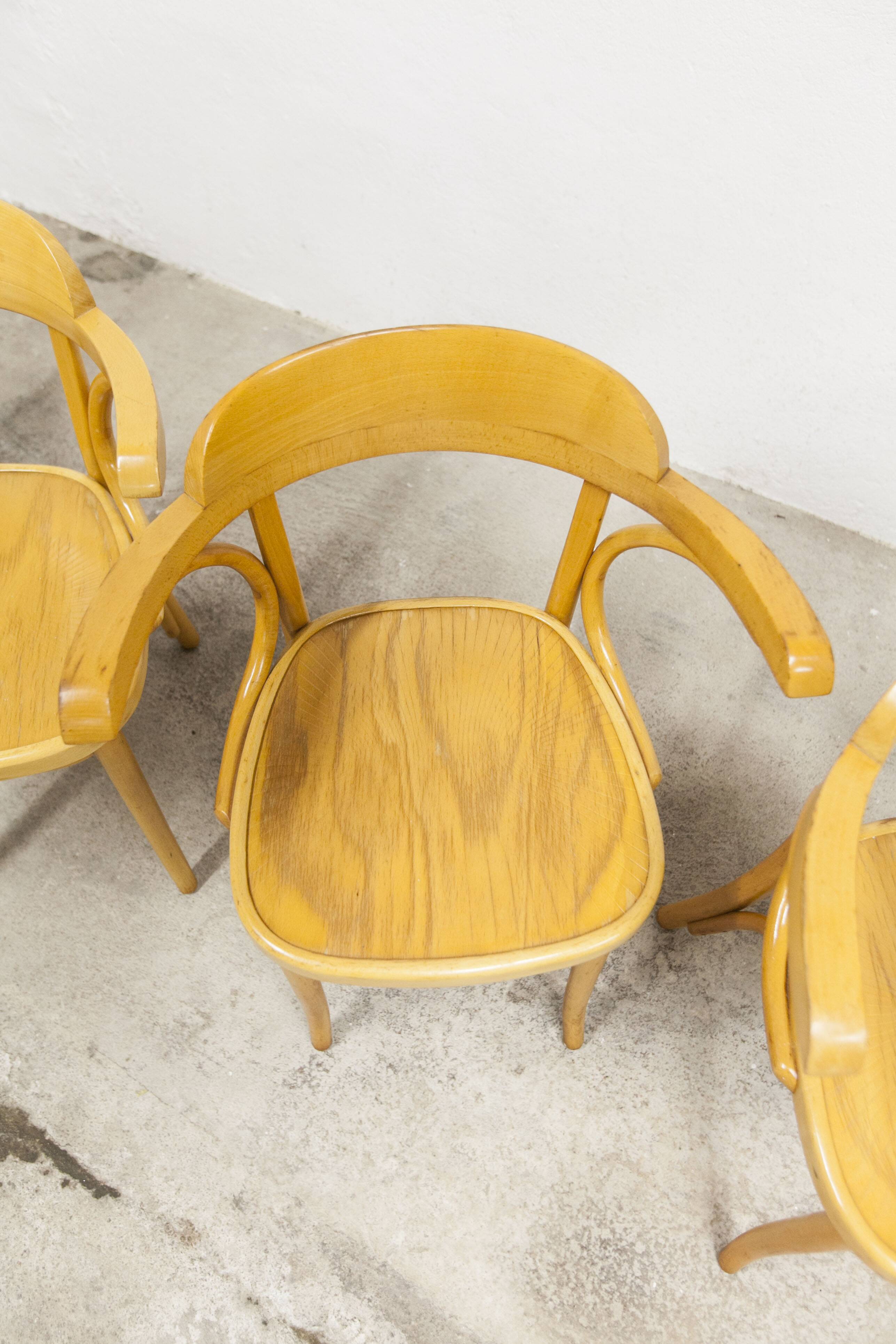 Set of 4 bistro armchairs with armrests from the 1960s.