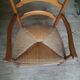 Large fauteuil paillé