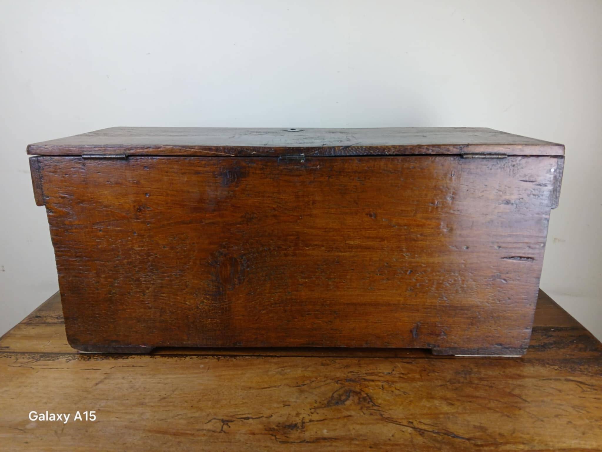 Old solid wood transport chest from the early 19th century