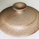 Covered terracotta pot