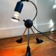 Articulated tripod foot lamp inspired by the Memphis movement