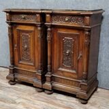 Pair of Renaissance style bedside tables in carved walnut circa 1850