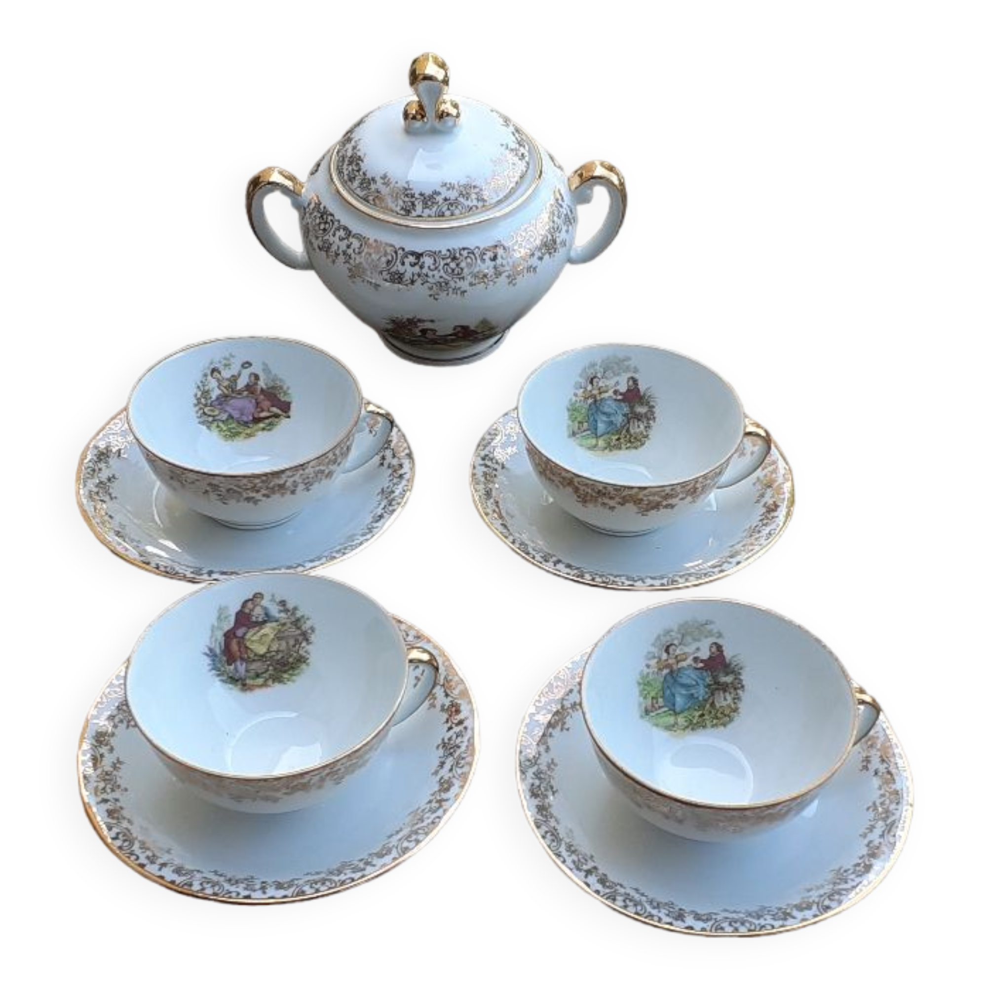 Set of 4 cups and sugar bowl Haute porcelaine de Berry