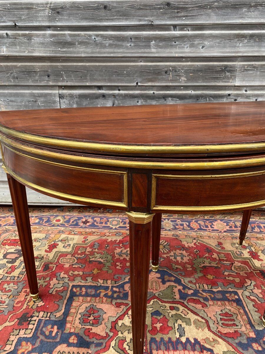 Half moon table in mahogany era Louis XVI XVIII th century