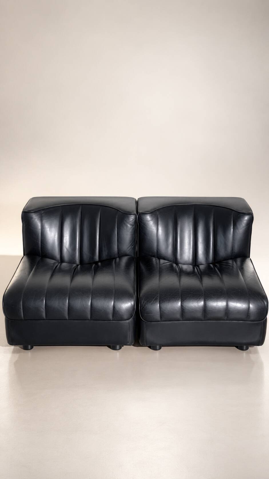 Modular black leather sofa '9000' by Tito Agnoli