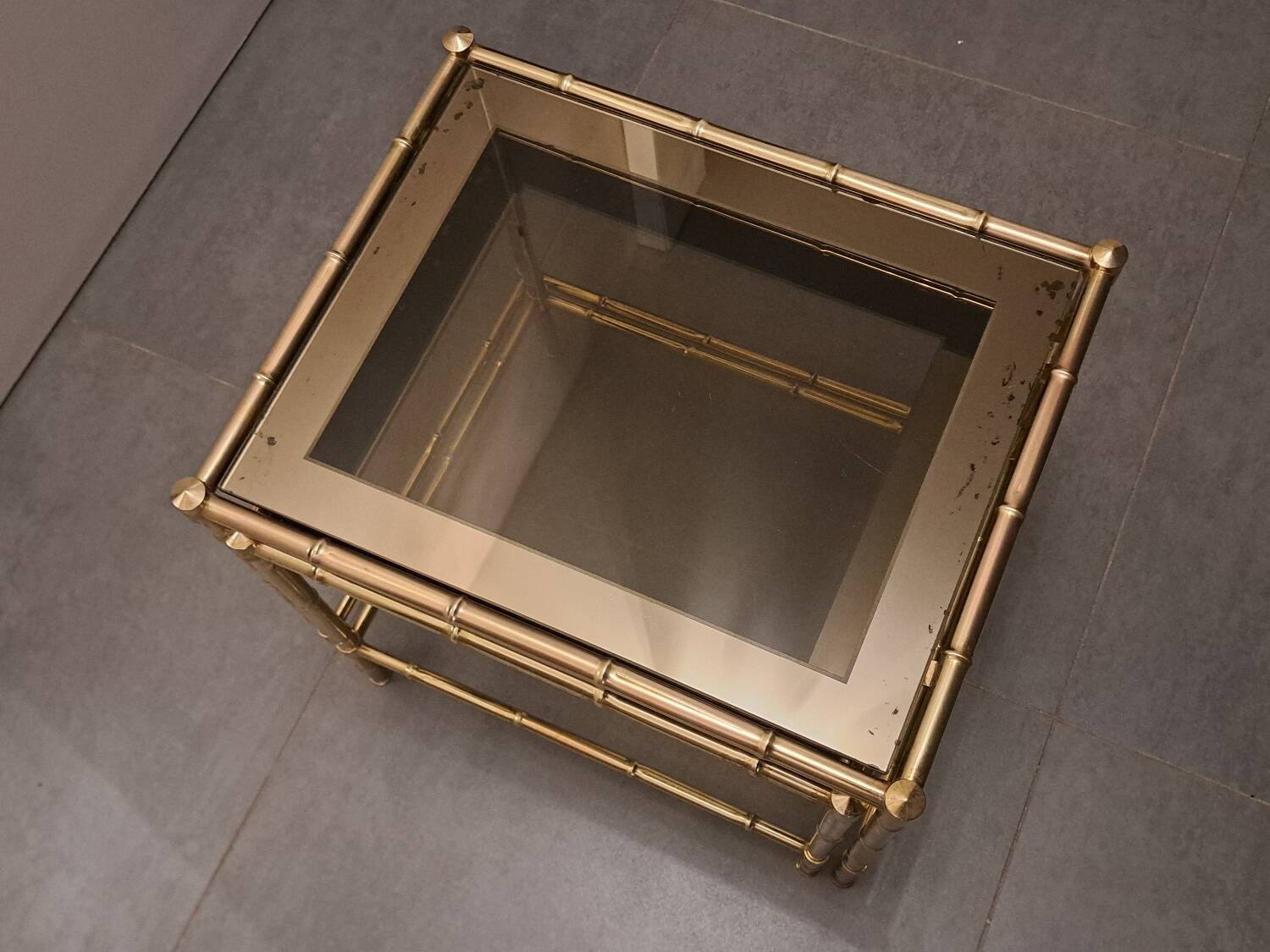 Nesting bamboo tables with gold-plated brass trim