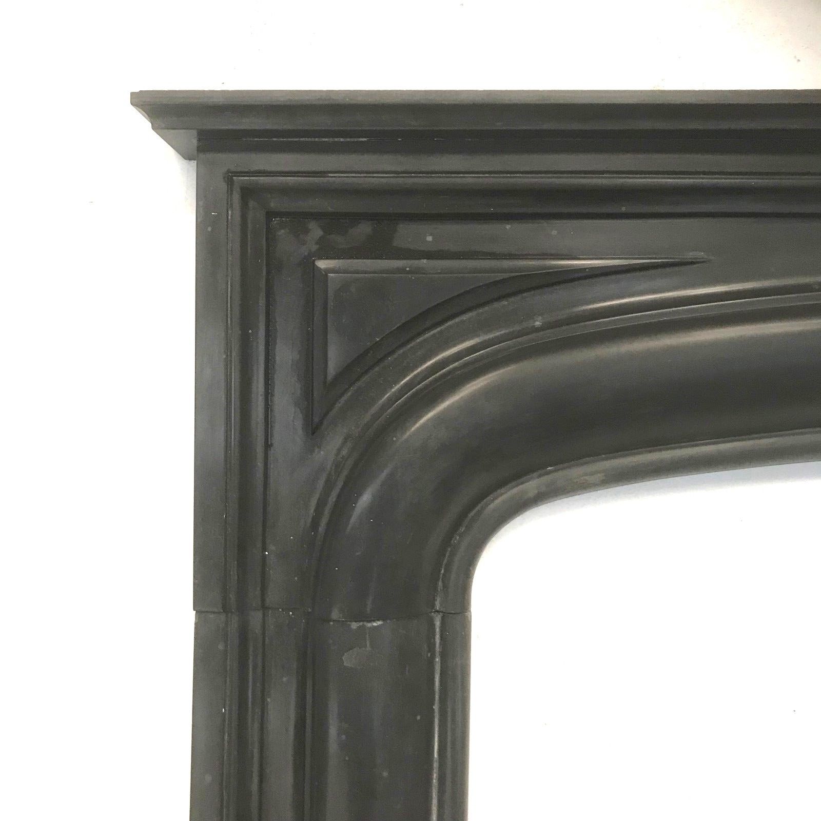 Old fireplace in black marble Louis Philippe