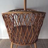Vintage rattan cradle with its spire
