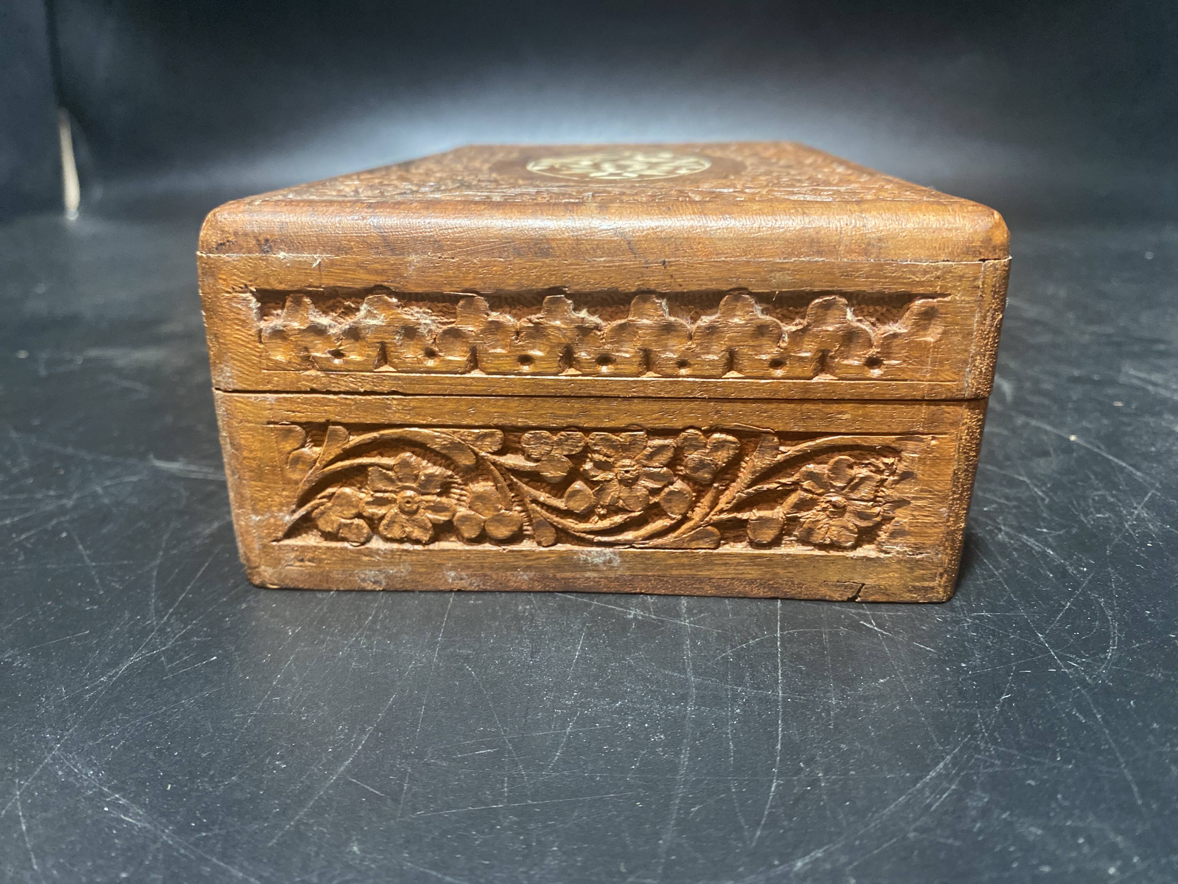 Carved wooden box