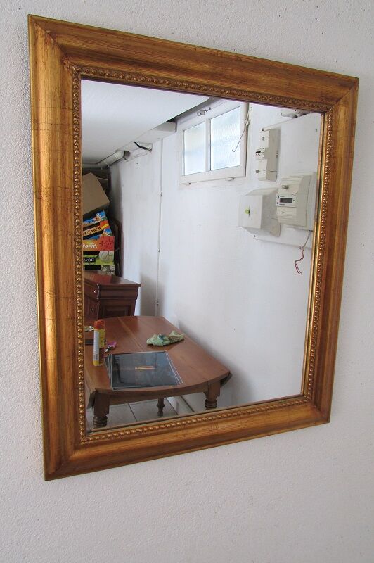 Rectangular mirror in gilded wood