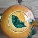 Vintage ceramic teapot in the shape of an orange – 1950s