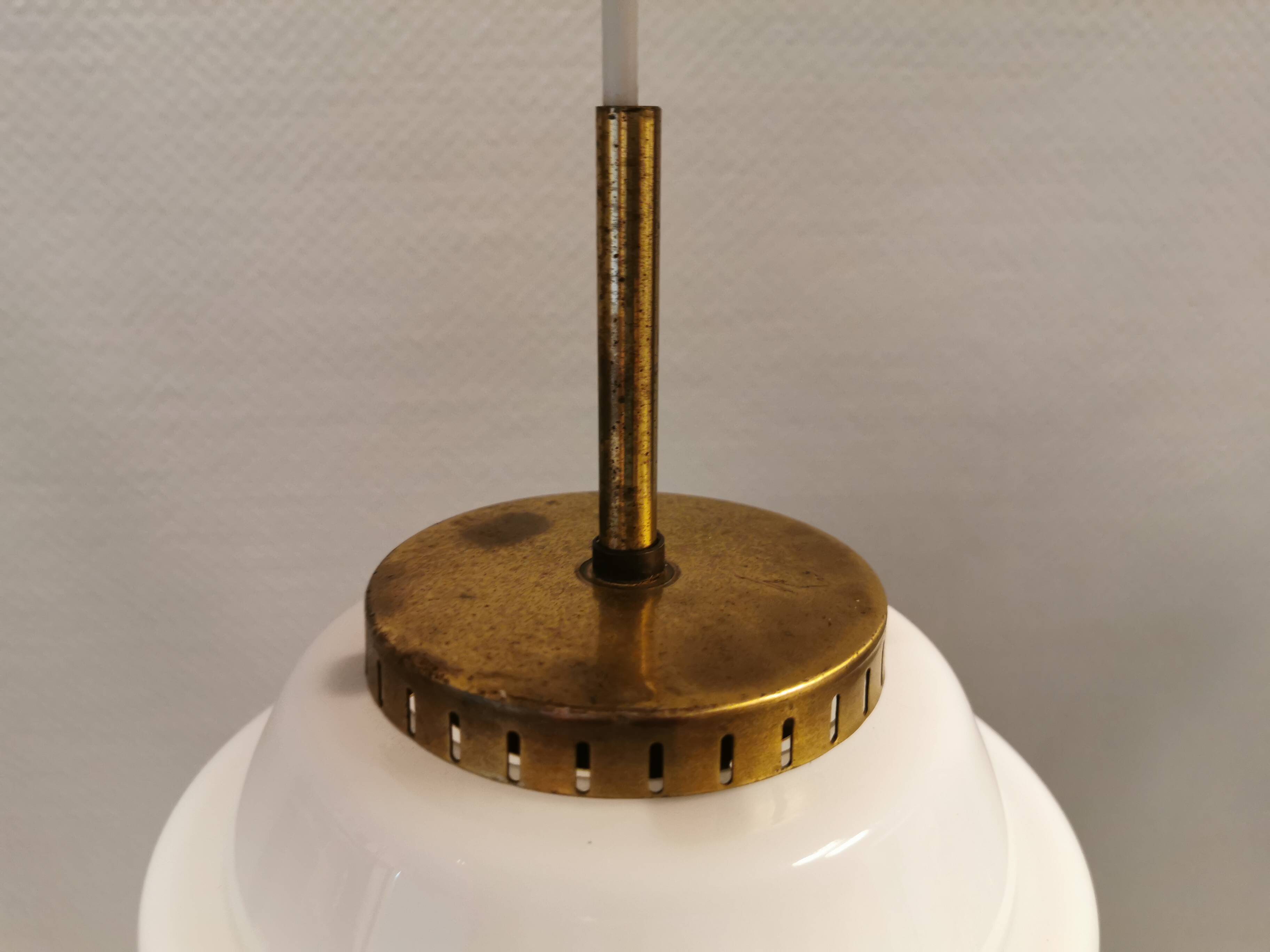 Hanging lamp in red lacquered metal and milky white opal glass 1970s Denmark.