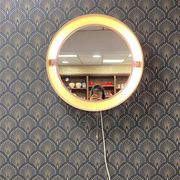 Vintage round luminous and pivoting spage age mirror by Allibert, circa 1970