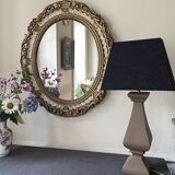 Miroir ovale résine dorée kitsch des années 70