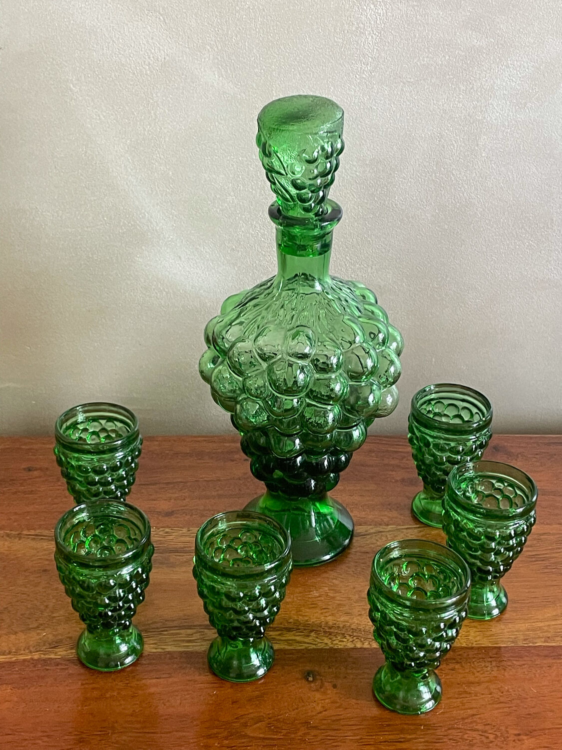 Liquor decanter and grape bunch shaped glasses