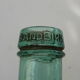 Charming bottle bottle brand BANDEIRA in vintage bluish green glass