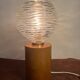Cylindrical base lamp in solid wood and chiseled glass globe