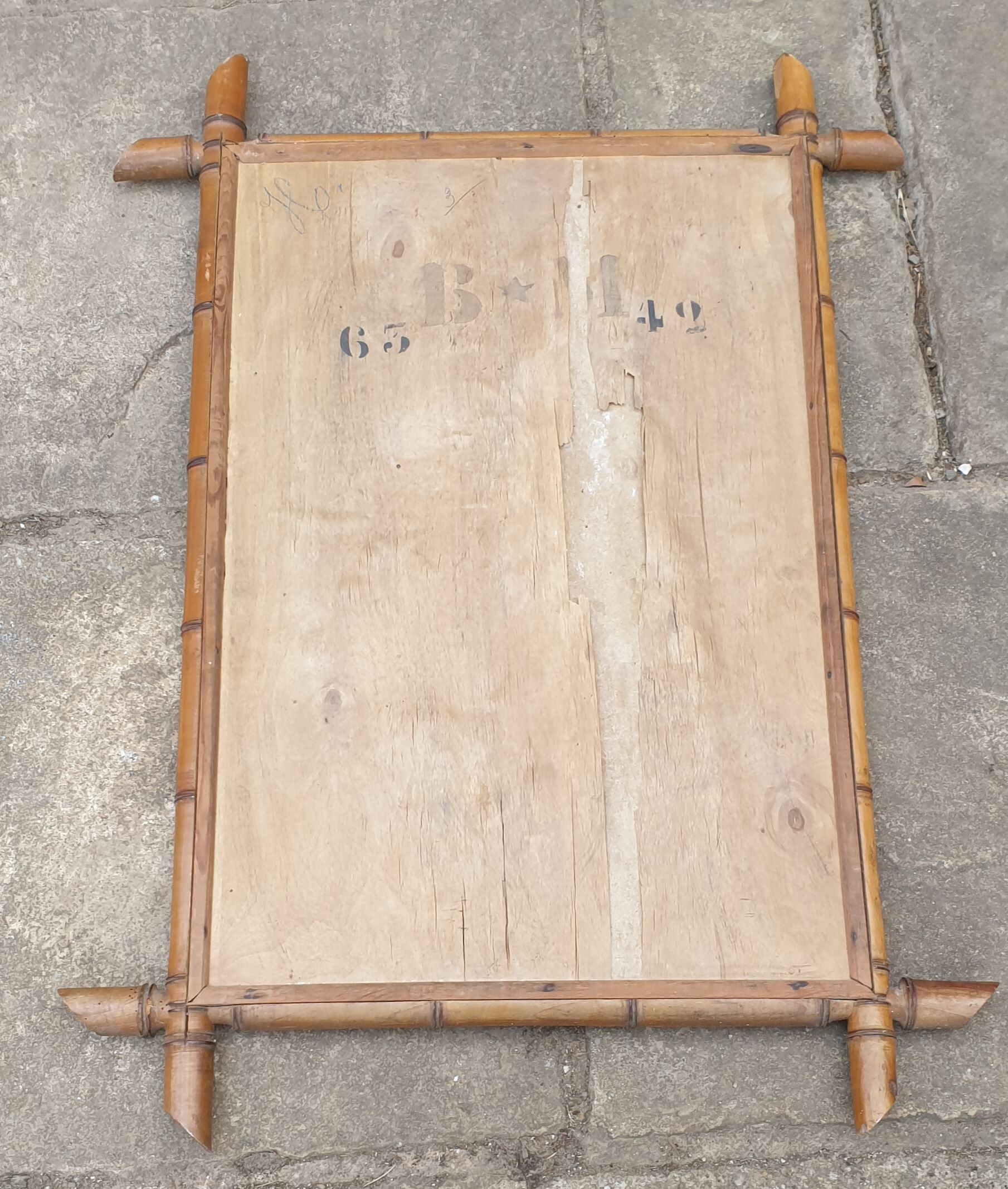 Old bamboo-style wooden mirror