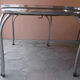 Vintage table of the 60s in red formica and chrome legs