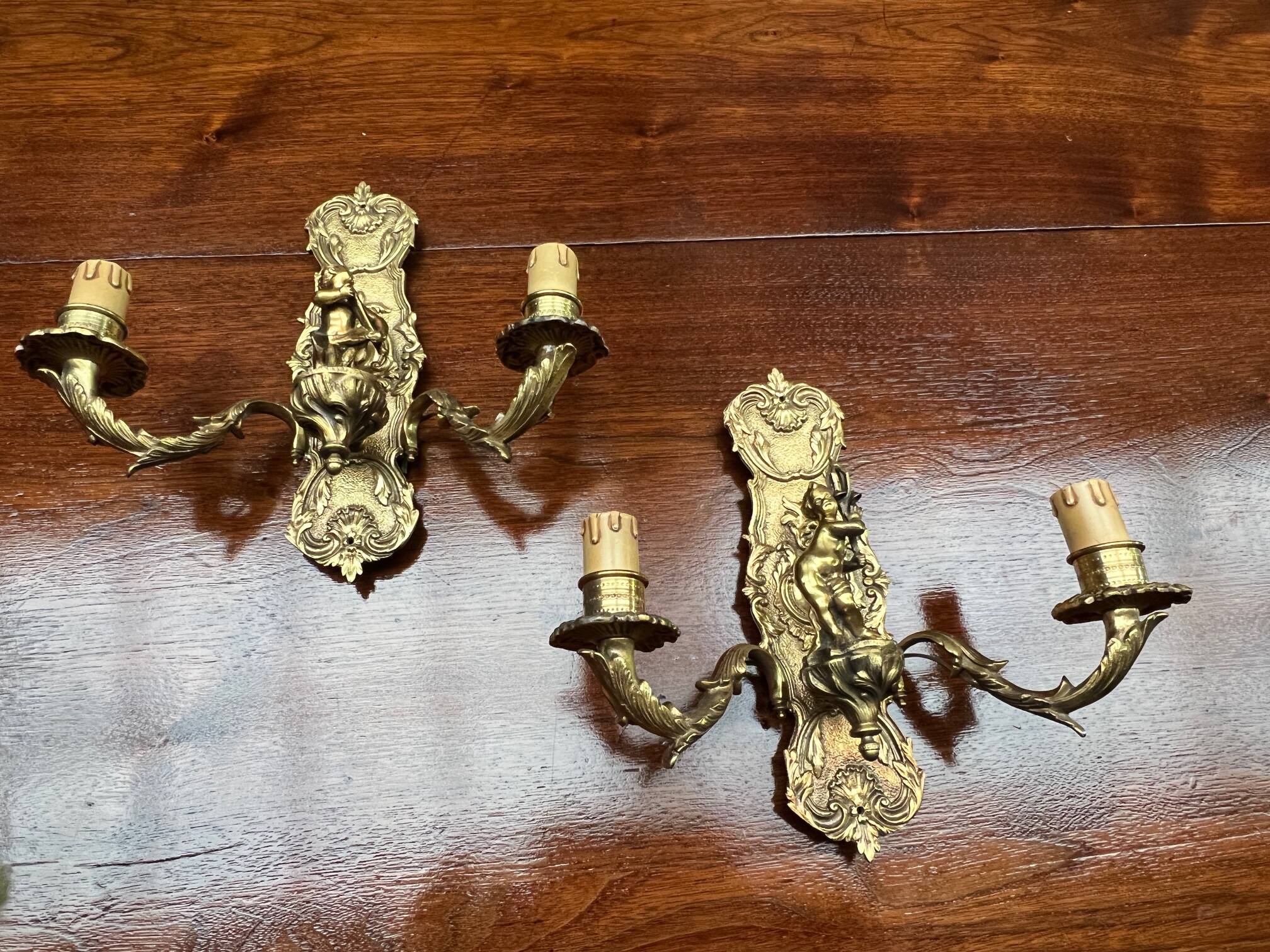 Pair of Louis XV style wall lights. Solid gilded bronze.