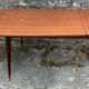 Table pieds effilés compas bois vernis extensible vintage années 50