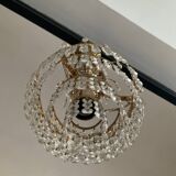 Cascade chandelier with crystal and brass tassels