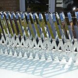 Expandable metal magazine rack