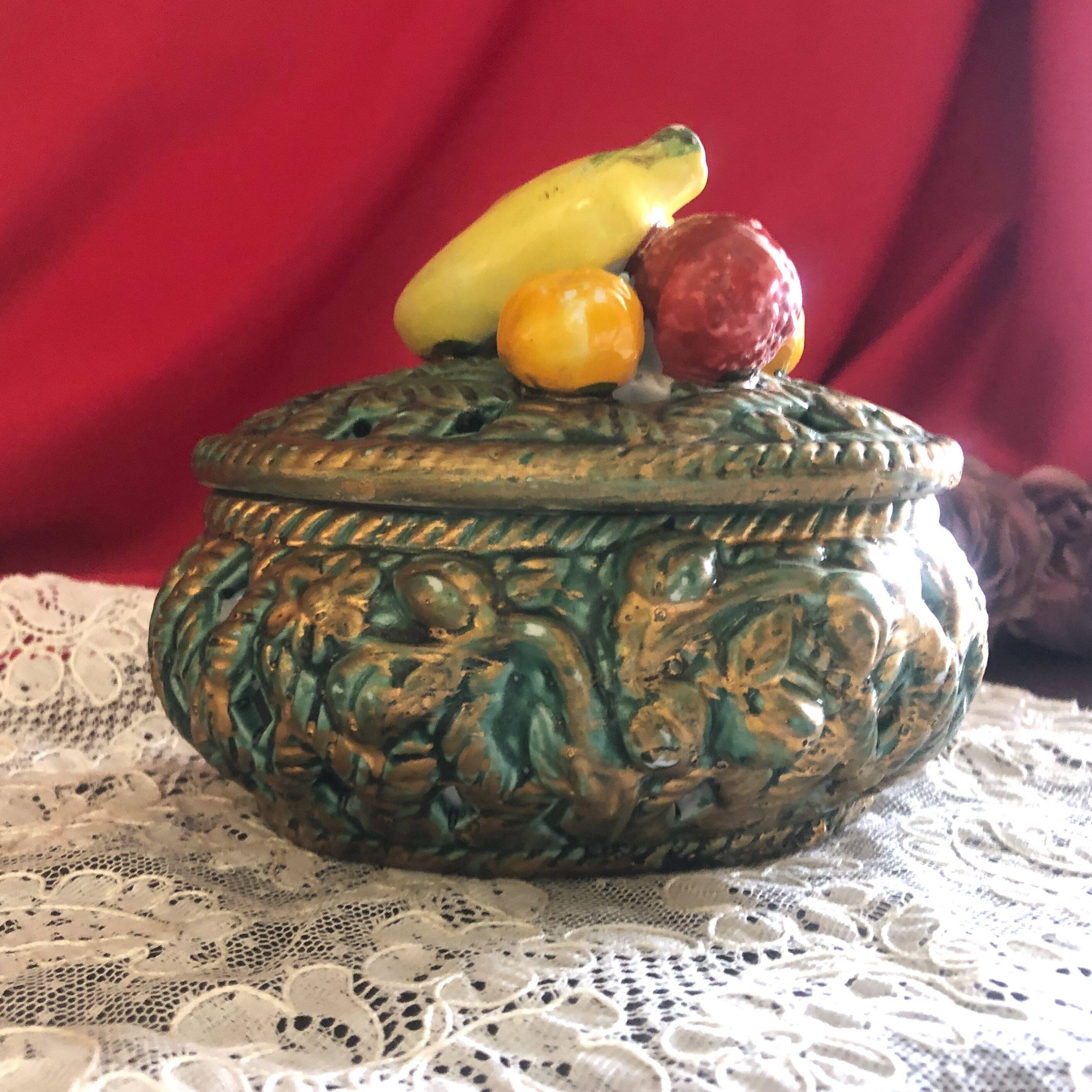 Openwork earthenware candy box with fruit slip