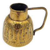 Persian jug in chiseled brass