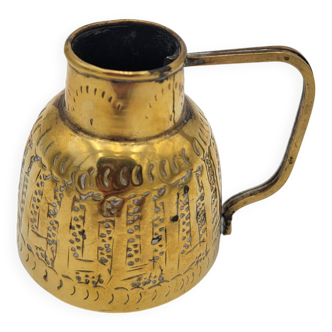 Persian jug in chiseled brass