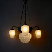 Art Deco lustre in brass and frosted pressed glass from the 1930s.